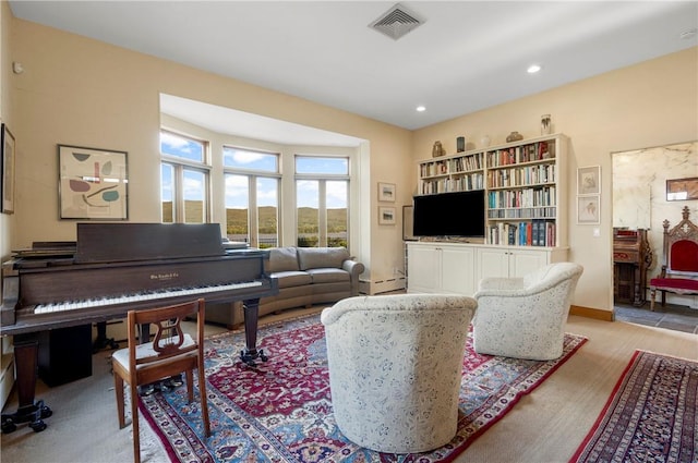 sitting room featuring a baseboard radiator