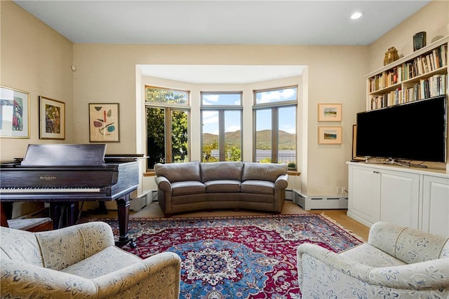 carpeted living room featuring a baseboard radiator