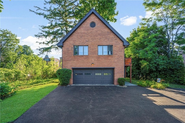 view of side of home featuring a garage