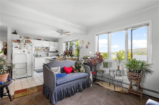 interior space with ornamental molding, ceiling fan, and baseboard heating