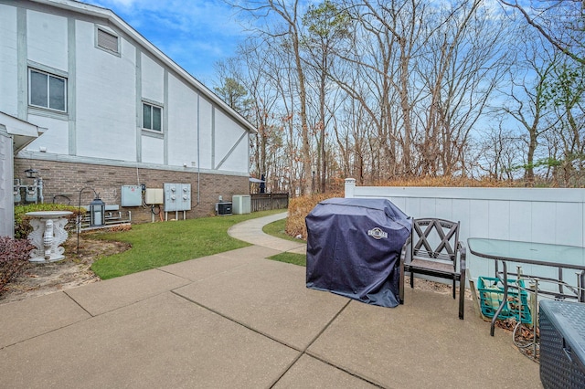 view of patio with a grill