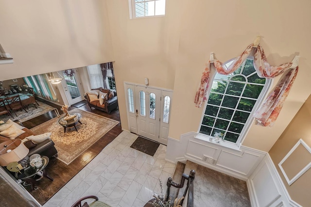 entrance foyer featuring a high ceiling