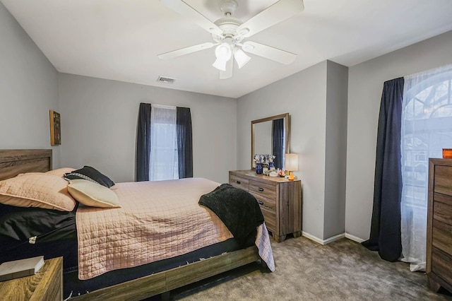 carpeted bedroom featuring ceiling fan