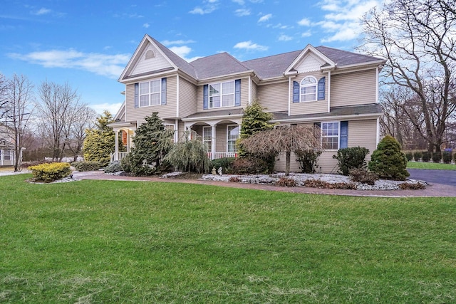 view of front of property with a front lawn