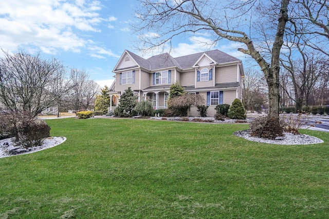 view of front of home featuring a front yard