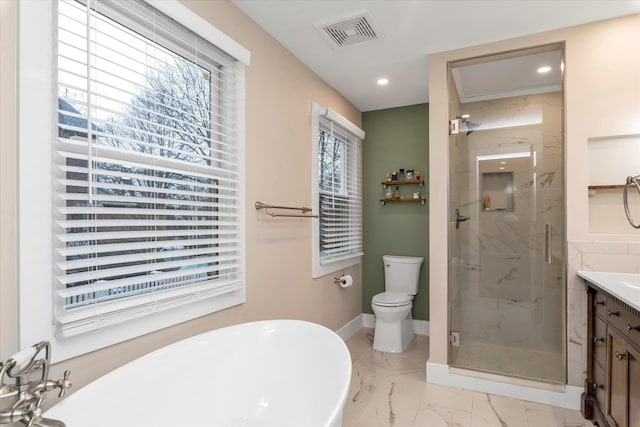 full bathroom with vanity, toilet, and separate shower and tub