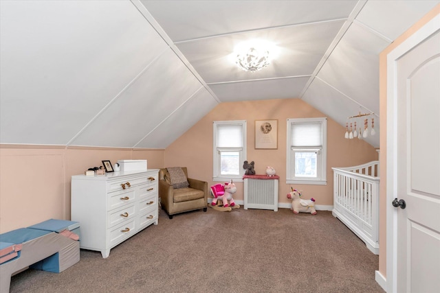 carpeted bedroom featuring lofted ceiling and radiator heating unit