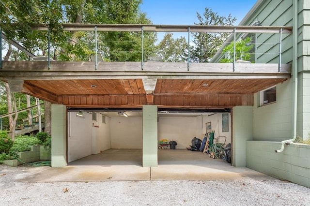 garage featuring a carport