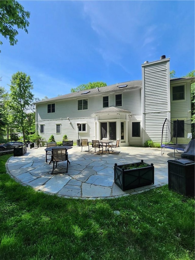 rear view of house with a patio area