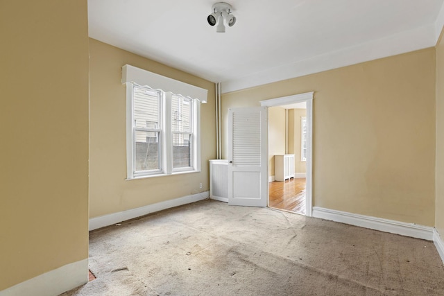 view of carpeted spare room