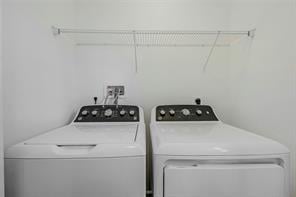 laundry area featuring separate washer and dryer