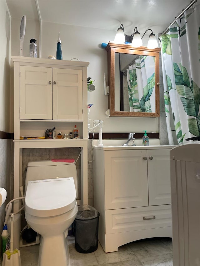 bathroom featuring sink and toilet