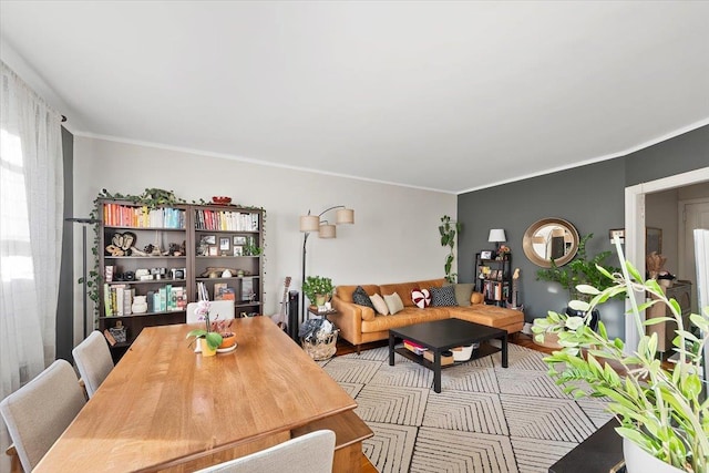 dining room featuring crown molding