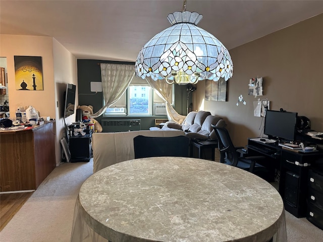 view of carpeted dining area