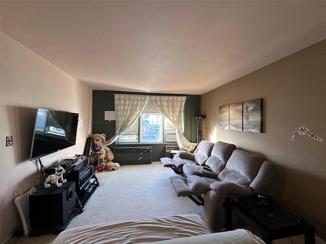 carpeted living room with radiator