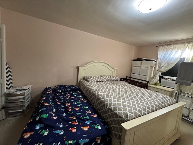 carpeted bedroom featuring cooling unit