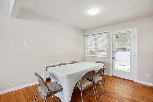 dining space featuring light hardwood / wood-style flooring