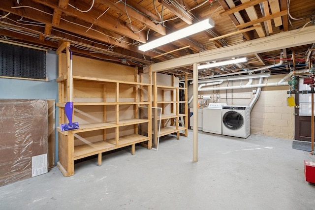 basement with washing machine and dryer