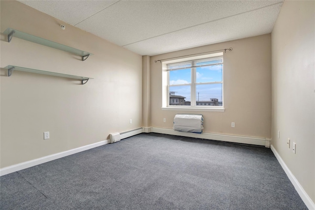 unfurnished room with carpet floors, a textured ceiling, and baseboard heating