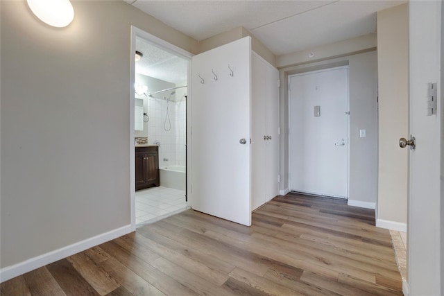 hall featuring light hardwood / wood-style floors