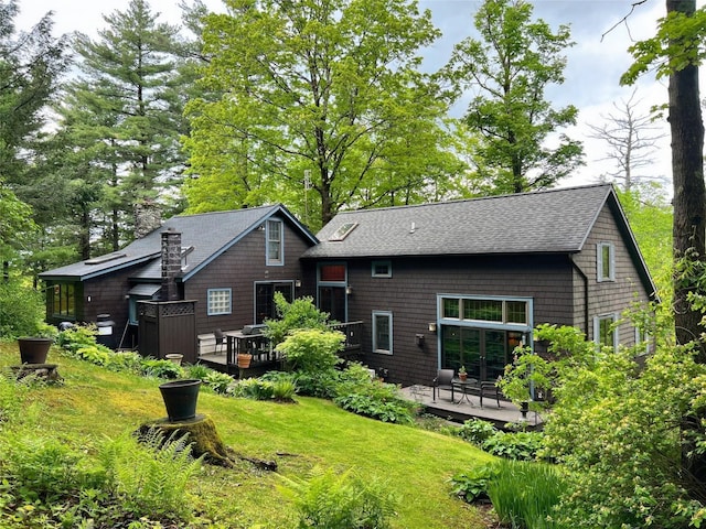 326 Pratt Hill Rd, Austerlitz, NY 12017 - rear view of property with a deck, a shingled roof, and a lawn