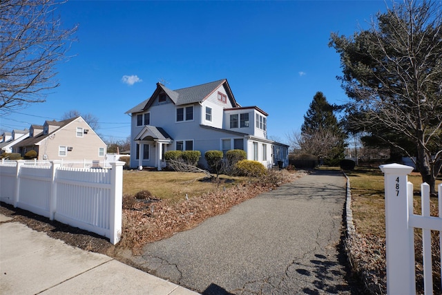 view of front of property with fence