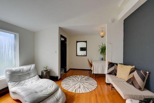 sitting room featuring wood finished floors