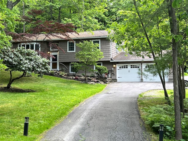 1179 E Mombasha Rd, Monroe, NY 10950 - split foyer home featuring asphalt driveway, a front yard, and roof with shingles