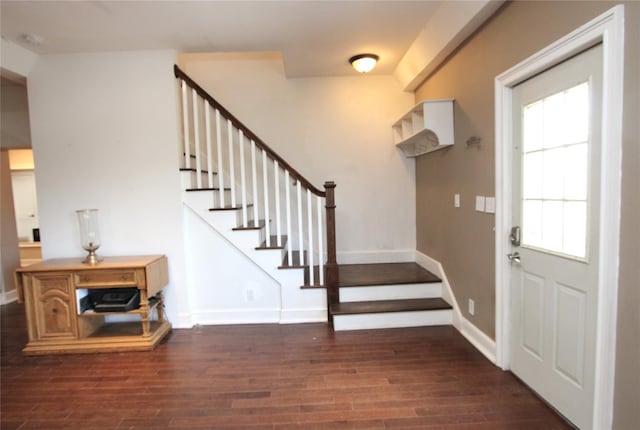 entrance foyer with dark hardwood / wood-style flooring