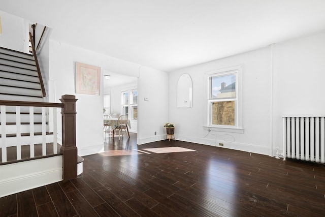 interior space featuring hardwood / wood-style floors and radiator heating unit