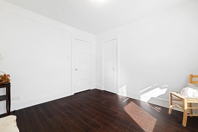 interior space with dark hardwood / wood-style flooring