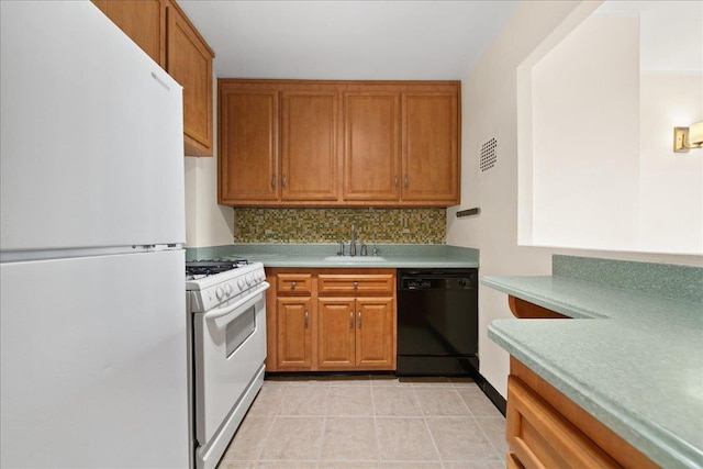 kitchen featuring sink, white appliances, light tile patterned flooring, and backsplash