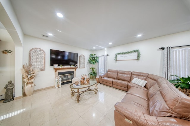 living room featuring light tile patterned flooring