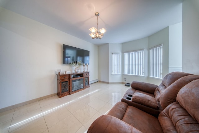 living room featuring baseboard heating, a chandelier, and light tile patterned flooring