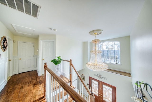 corridor featuring dark hardwood / wood-style floors