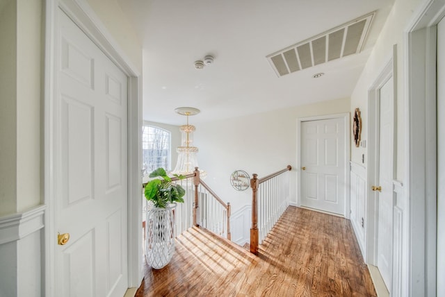 entryway with hardwood / wood-style flooring