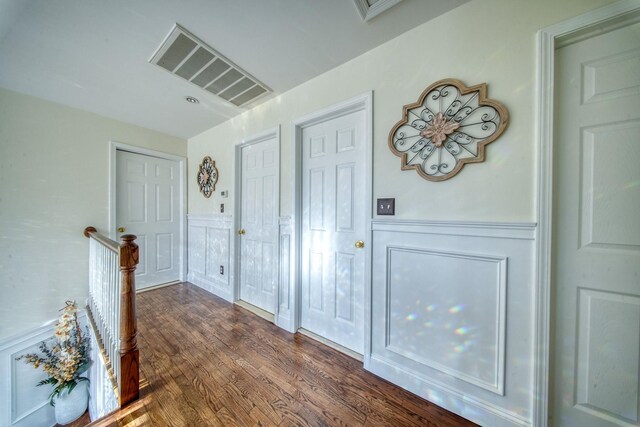 foyer with dark hardwood / wood-style flooring