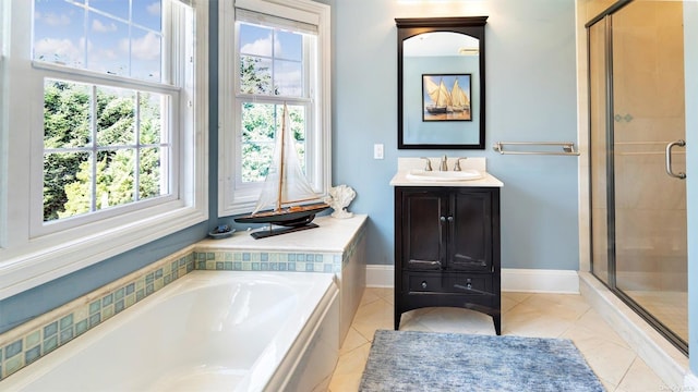 bathroom with tile patterned floors, vanity, and plus walk in shower