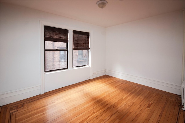 empty room featuring hardwood / wood-style floors