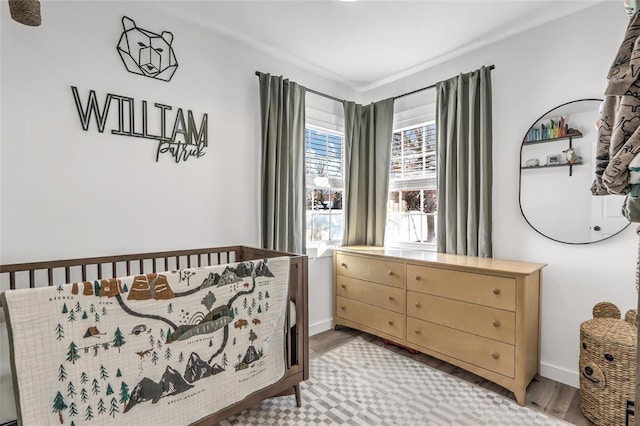 bedroom featuring hardwood / wood-style floors