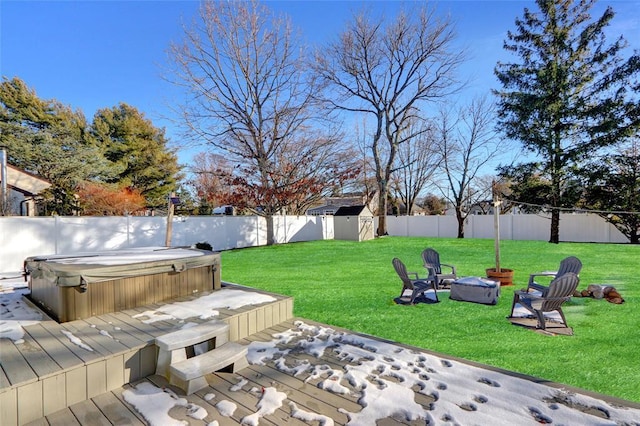 view of yard featuring a hot tub and a deck