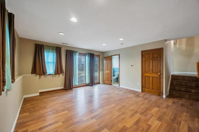 unfurnished room featuring light hardwood / wood-style floors