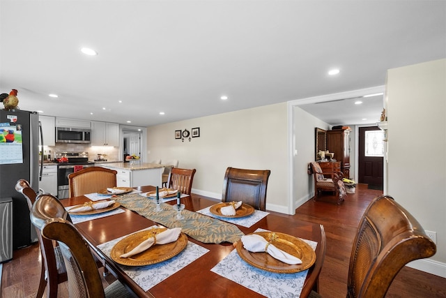 dining room featuring dark hardwood / wood-style flooring