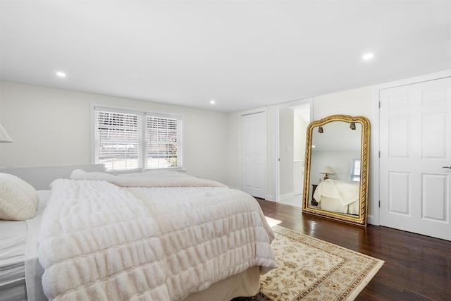 bedroom featuring dark wood-type flooring