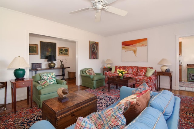 living room with hardwood / wood-style floors and ceiling fan