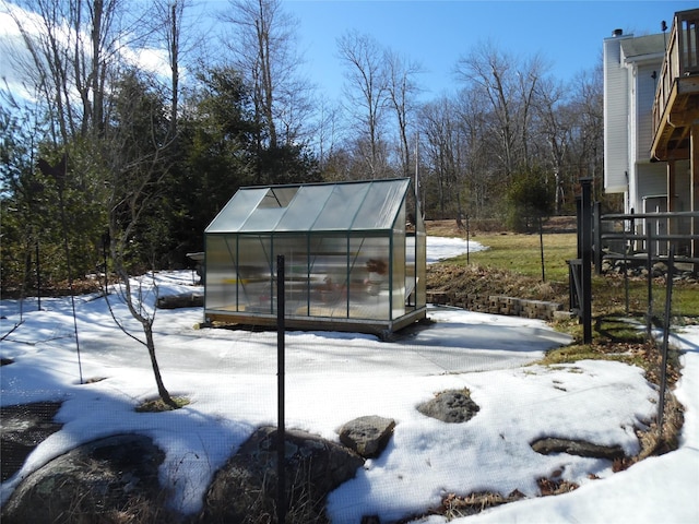 exterior space featuring an outbuilding and an exterior structure