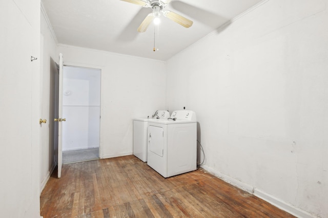 washroom featuring hardwood / wood-style flooring, ceiling fan, crown molding, and washer and clothes dryer