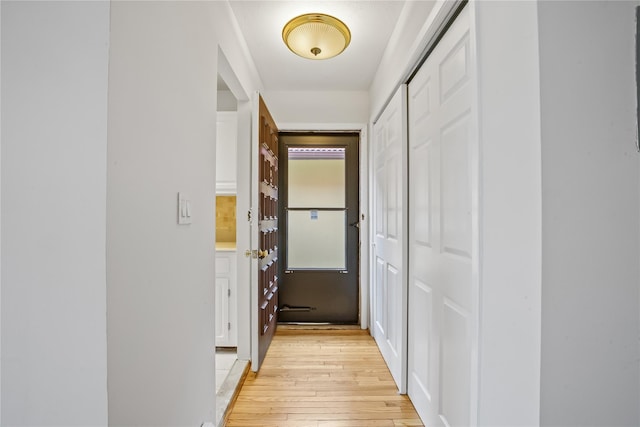 hall featuring light hardwood / wood-style flooring