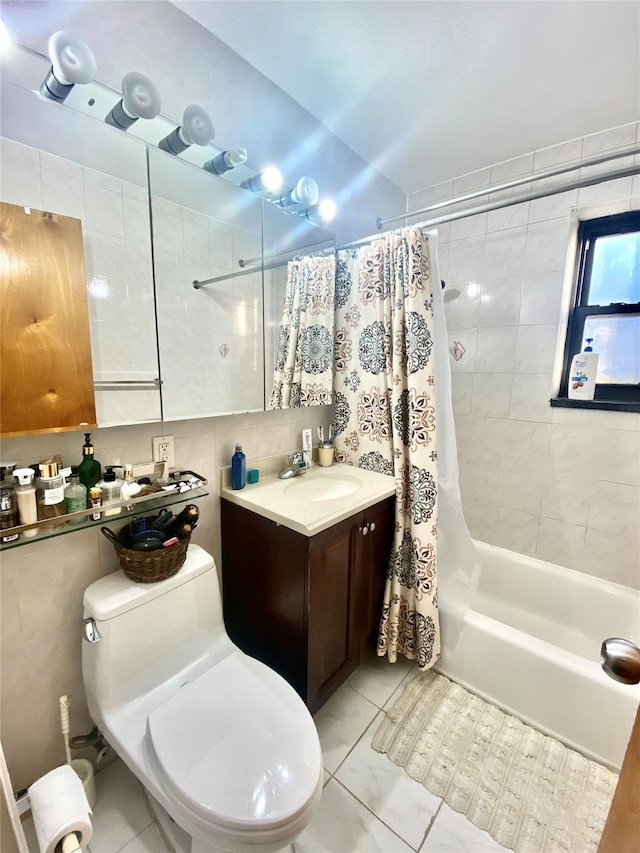 full bathroom with toilet, tasteful backsplash, tile walls, vanity, and shower / bath combo