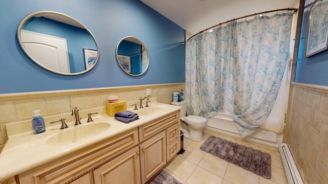 full bathroom featuring shower / tub combo with curtain, tile walls, a baseboard heating unit, tile patterned flooring, and toilet